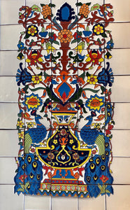 Traditional hand painted talavera Pavoreal mural.